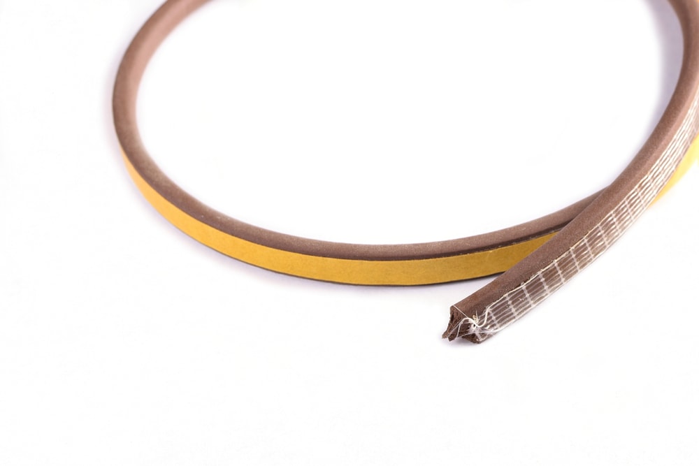 Weatherstrip tape. Self adhesive foam  seal strip for doors and windows.
