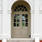 Beige wood front door - Pinnacle Home Improvements