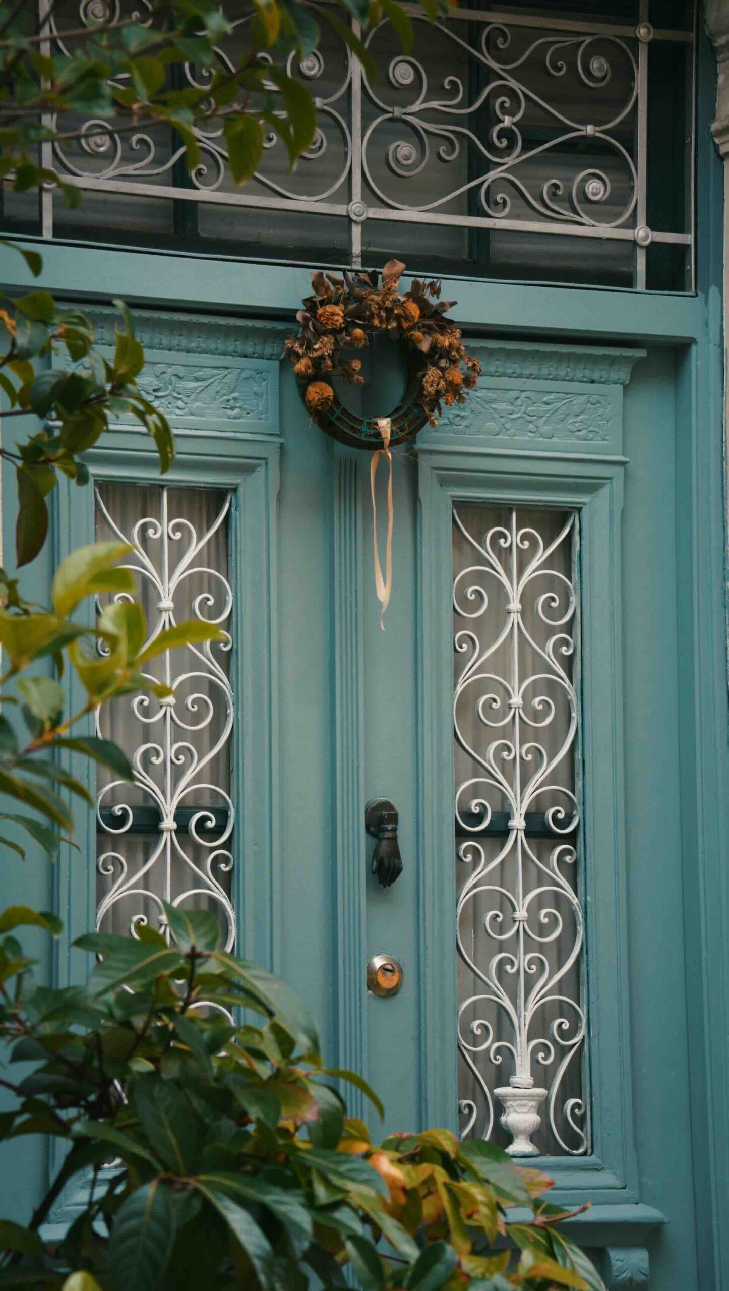 Blue front door with ironwork - Pinnacle Home Improvements