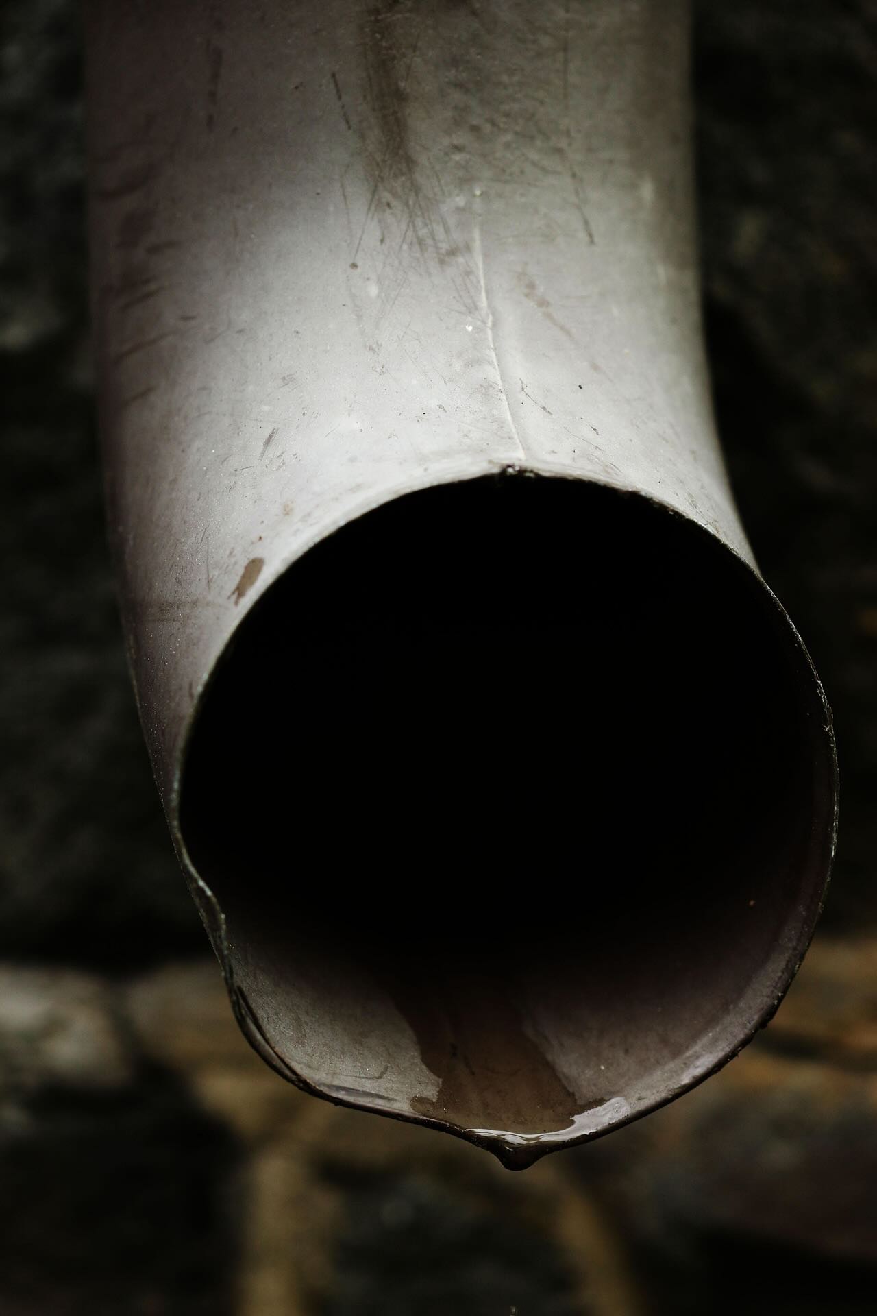 Gutter with water dripping out - Pinnacle Home Improvements