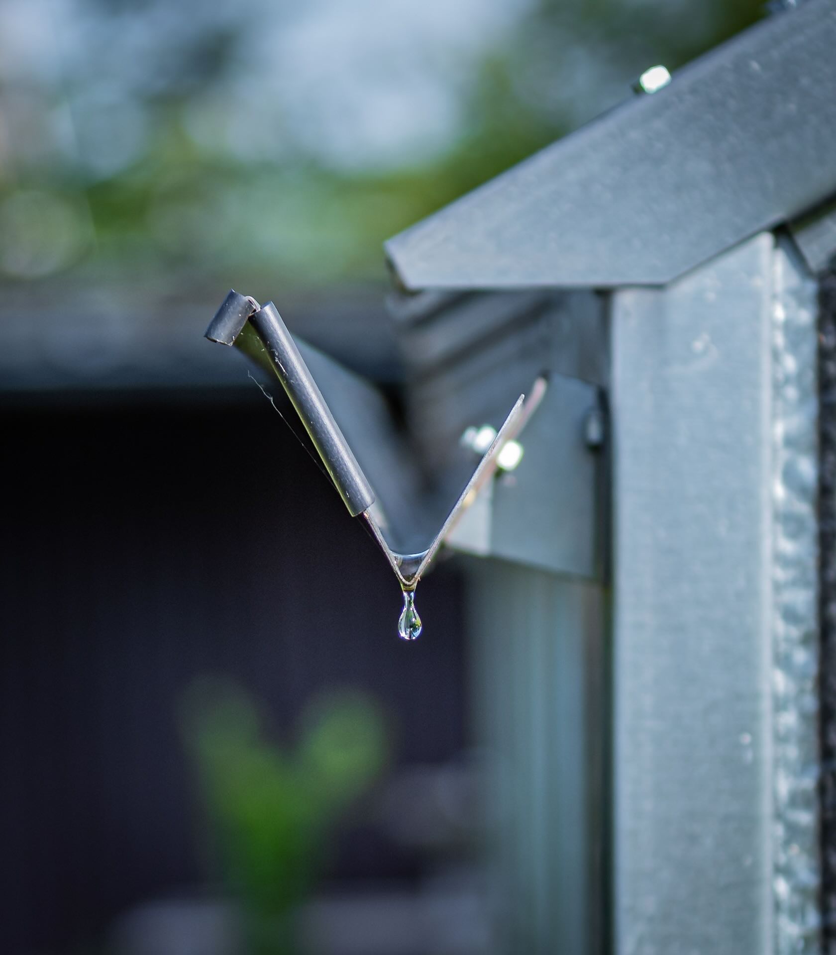 Gutter with falling drop of water - Pinnacle Home Improvements